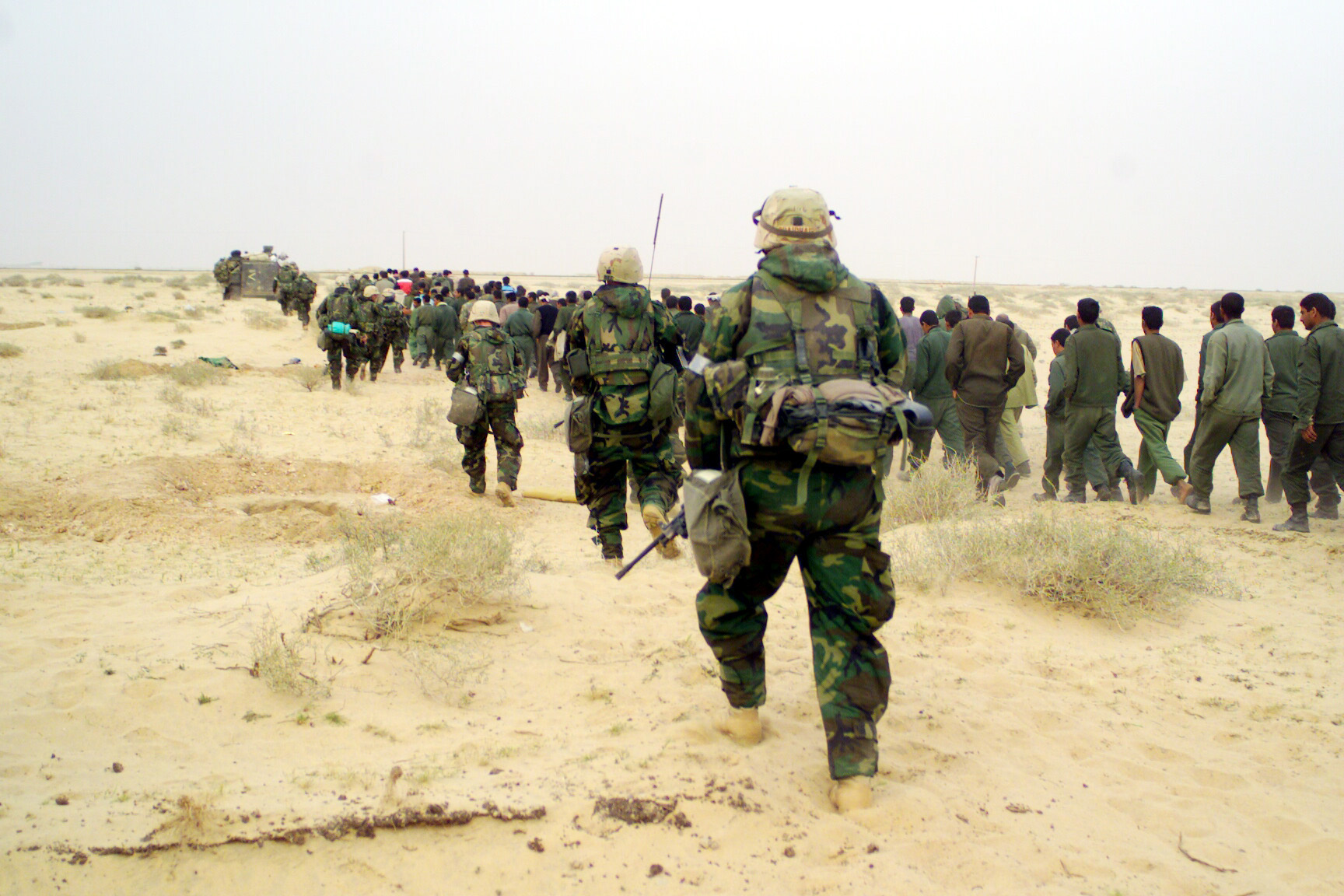 U.S._Marines_with_Iraqi_POWs_-_March_21,_2003.jpg
