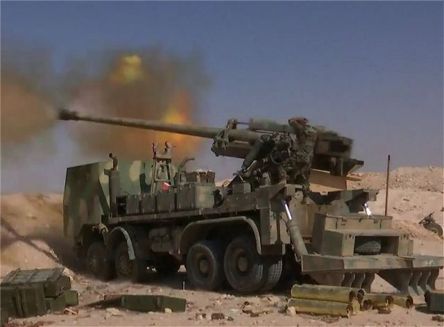 Syrian_military_forces_produced_locally_130mm_M-46_8x8_self-propelled_howitzer_640_003.jpg